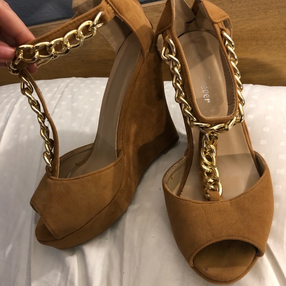 Brown wedges with gold chain. Zips from the back